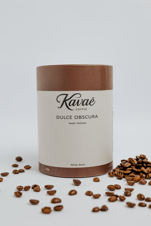 Kavae coffee canister with coffee beans on a light background