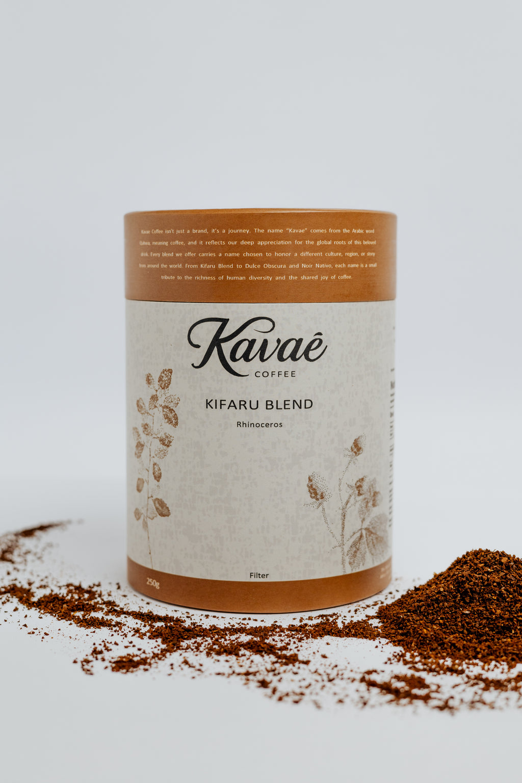 Kaváé Coffee Kifaru Blend container with coffee grounds on a light background