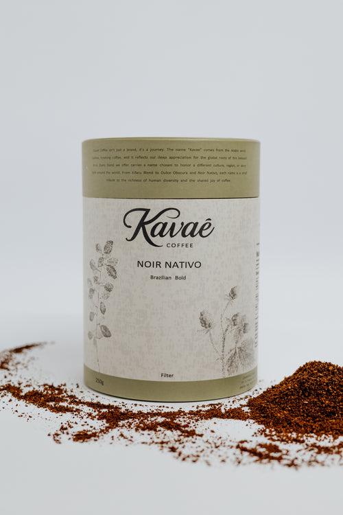 Kavae coffee canister with coffee grounds on a light background